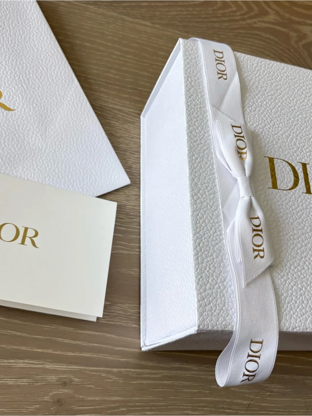 Dior gift box and bag with logo ribbon